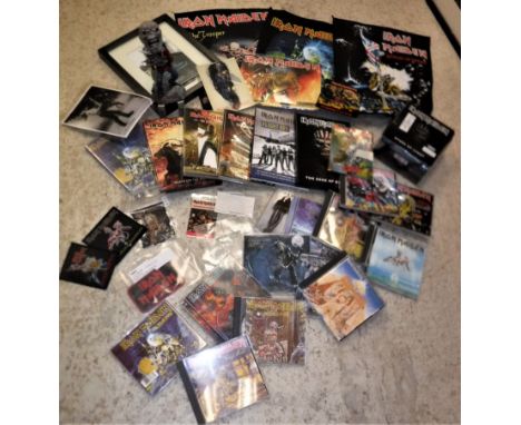 A box containing a collection of various IRON MAIDEN ephemera including VHS videos "Life After Death", "Donnington Live 1992"