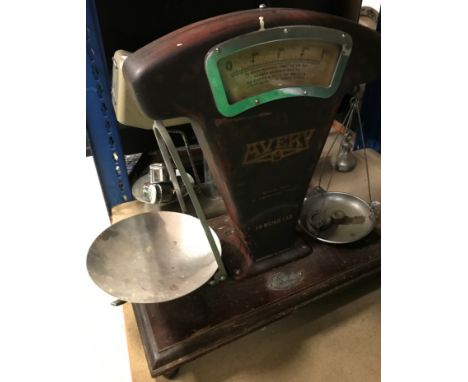 A set of Avery pan scales, together with a further set of mid 20th Century un-named money scales with various weights