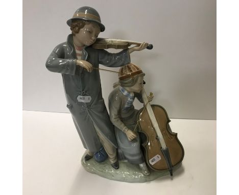 A Lladro figure of "Two nuns" (black), 33 cm high, Lladro figure of "Girl in hat", 35 cm high and Nao figure of "Musicians, h