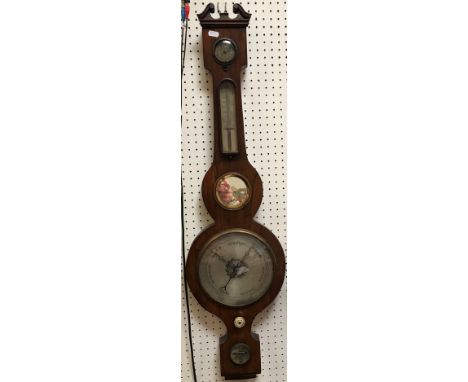 An early Victorian rosewood cased banjo barometer thermometer with central mirrored panel surmounted by an alcohol thermomete