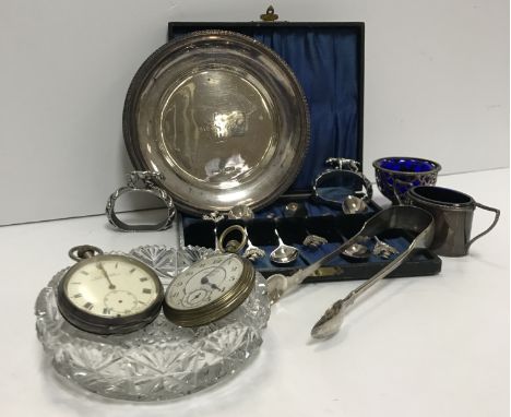 A collection of silver wares to include a cased set of six coffee spoons with "Thistle" set finials, a pair of Georgian silve