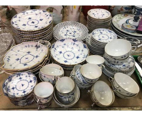 A collection of Royal Copenhagen blue and white china to include four leaf shaped dishes, three shallow bowls, pair of lattic