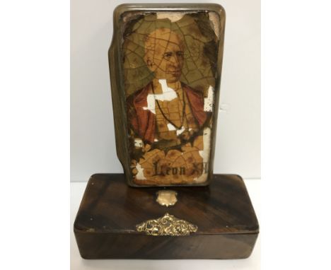 A 19th Century horn snuff box decorated with printed portrait of Leon XII, 9.5 cm wide (top with damage), together with a 19t