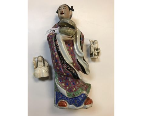 A circa 1900 Chinese polychrome decorated porcelain figure as a "Girl in kimono holding a lidded bowl", bears impressed signa