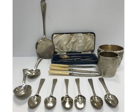 A set of six bright cut teaspoons by Hester Bateman (London 1821), two silver table spoons by Emile Viner, a silver cake slic