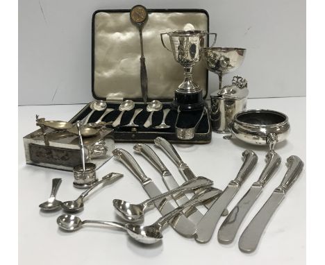 A collection of silver wares to include six pistol grip butter knives (by Harrison Brothers &amp; Howson, Sheffield 1903), a 