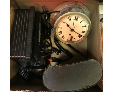 A box containing a vintage British Telecom phone with mains unit / fast charger, a brass cased ship's clock, the enamel dial 