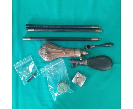 A mixed lot including a Bartram &amp; Co copper powder flask (spring as found), a G &amp; J.W Hawksley oil bottle, an Eley ca
