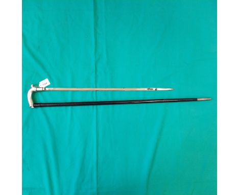 An Anglo Indian swordstick with 24 1/2" flat form blade (rust patch towards spear point) otherwise good condition for this st