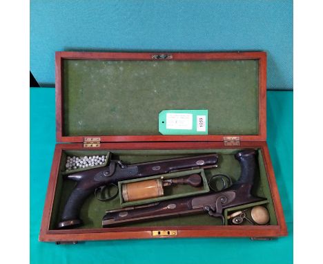 A cased pair of saw handle percussion target/duelling pistols by Holden Liverpool, each approx 14 1/2" overall with 9" sighte