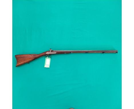 A percussion double barrel shotgun by Westley Richards with 29 1/2" barrels of approx 13 bore, two stage action working and r