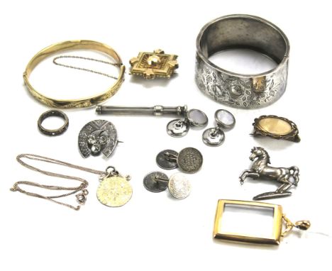 Assorted costume jewellery. To include cufflinks, white metal toothpick, sterling silver hinged bangle, pinchbeck brooch and 