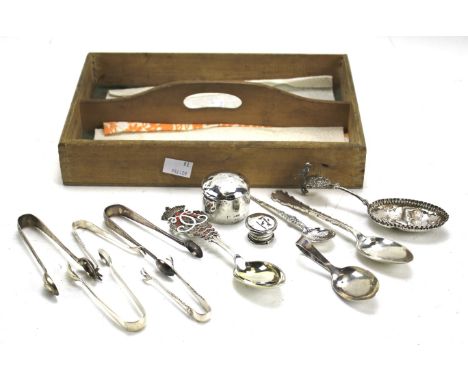 Assorted silver flatware, sugar tongs and other items. 19th century and later, including five sugar tongs, a caddy spoon, a D