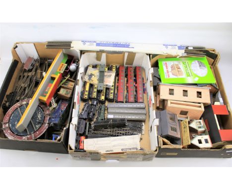 Three boxes of OO and O gauge model railway related items. To include Hornby locomotives and carriages, track and scenery