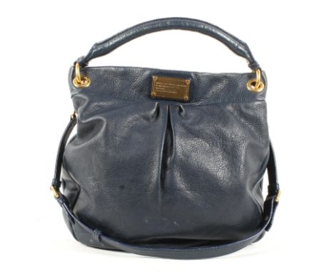 A Marc Jacobs navy leather shoulder bag. With gilt-metal fastenings and fittings, the label inscribed Marc by Marc Jacobs/Sta