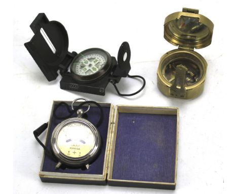 A Stanley Natural Sine marine compass, another and a Voltmeter, boxed. The voltmeter marked JT Foreign, in original box