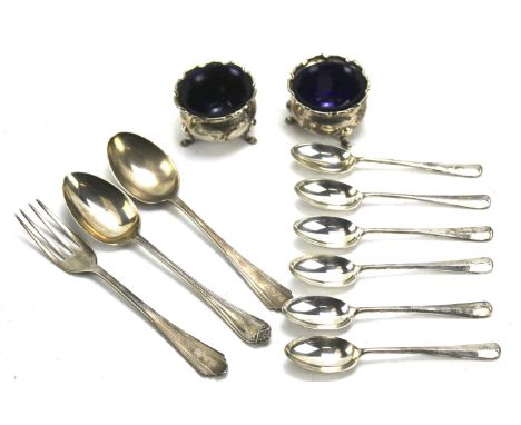 Two silver salts and glass liners and a collection of silver flatware. 19th century and later, the salts hallmarked Birmingha