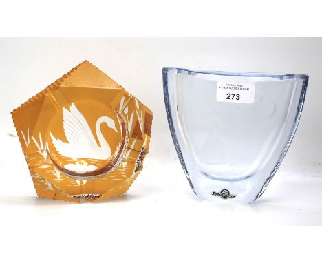 Two pieces of decorative glassware. Comprising a cased glass Strombergshyttan vase and an orange cut glass ashtray