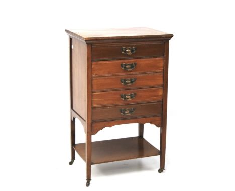 A 20th century mahogany filing cabinet. Five long drawers with metal handles, over a single shelf, raised on tapered supports