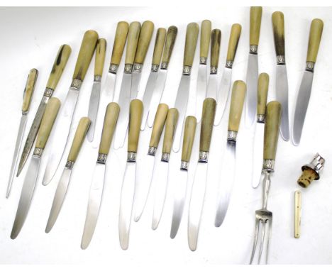 A quantity of vintage French knives and a serving fork. The blades marked St Etienne