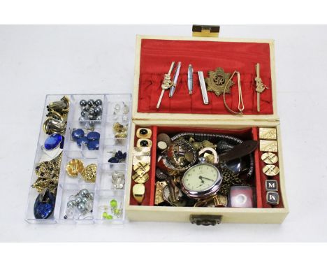 A jewellery box containing an assorted collection of cufflinks, tie clips, watches, medal and other items. 