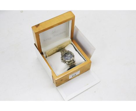 A boxed Krug-Baumen Sports Master diamond chronograph gentleman's wristwatch. With certificate stating 8 or 11 diamonds used 