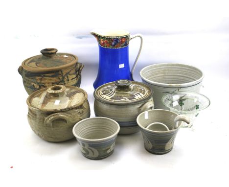 An assortment of stoneware pottery. Including a lidded jar, bowls, tureens etc, all glazed, some marked on the base, together