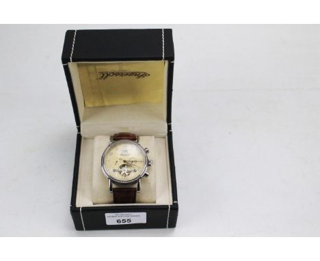 A boxed Intersoll gentleman's wrist watch. Automatic with case and Calibre 735 instruction manual, on brown leather strap