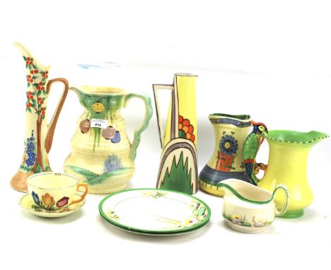 An assortment of 20th century ceramics. Including a Staffordshire cup and saucer decorated with flowers, a Myott Son &amp; Co
