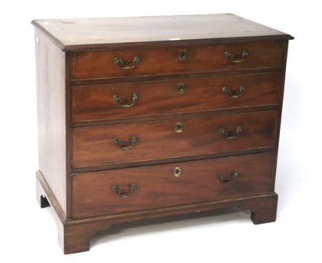 A mahogany chest of drawers. Four long drawers of graduating size, all with metal handles, raised on bracket supports, L93cm 
