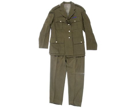 A 20th century British military army coat with related buttons and badges.