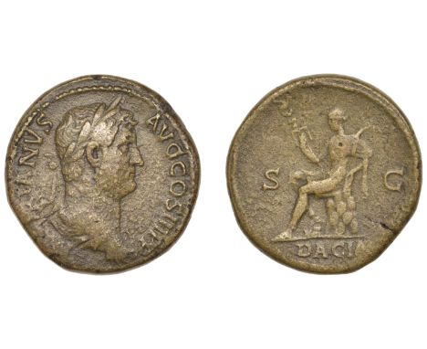 Roman Imperial Coinage, Hadrian, Sestertius, 130-3, laureate and draped bust right, rev. Dacia seated left on rocks, holding 