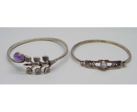 A Swedish silver bangle set with a cabochon amethyst by Borgila and one other silver bangle, (Borgila 62mm)