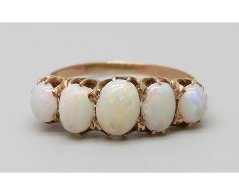 A yellow metal and five stone opal ring, 1.8g, L