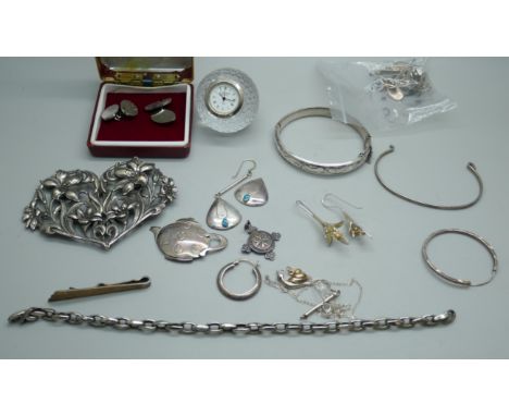 A pair of silver cufflinks, an Art Nouveau buckle, a silver teapot brooch, a silver bangle, silver earrings, an Edinburgh cry
