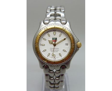 A Tag Heuer S/EL 87 automatic chronometer wristwatch, purchased 1999 with original boxes, instructions, receipts and spare li