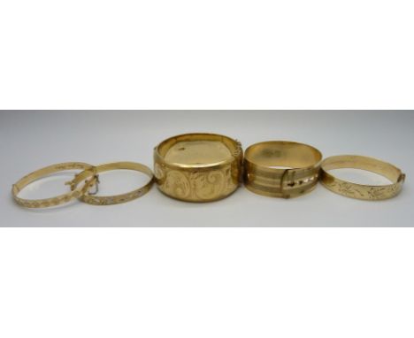 A wide Excalibur rolled gold bangle and four other rolled gold/metal core/back and front bangles, (5)