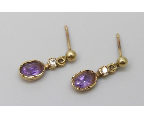 A pair of 9ct gold and amethyst earrings, 1g