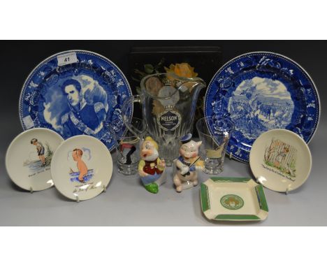 A Walt Disney Snow White Dwarf;  another Fiddling Pig;  the Liverpool Road Pottery saucy pin dishes, each printed with comica