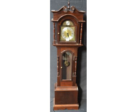 A reproduction grandmother clock, Tempus Fugit arched brass face, silvered chapter ring, Roman numerals