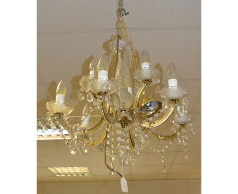 A Regency style brass four light ceiling lamp, decorated with stylized Phoenixes;  a six branch, nine light, electrolier (2()