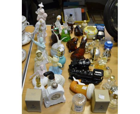 Avon ladies' and gentlemen's cologne bottles including Eiffel Tower, pheasant, steam locomotive, mantel clock, ballerina, etc