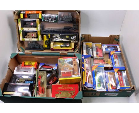 Three trays containing a quantity of various military and emergency services related diecasts to include First Response, Corg