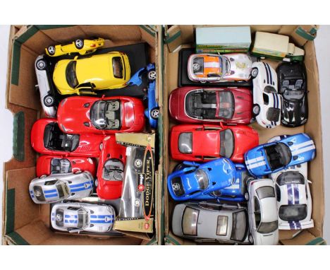 Two trays containing a collection of mixed 1/18 and 1/24 scale modern release diecast to include Maisto, Bburago, and others