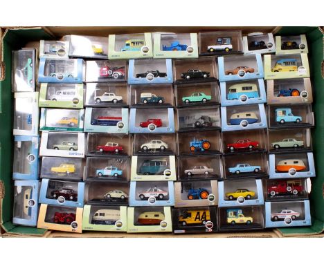 52 various plastic cased Oxford 1/87 and 1/76 scale diecast vehicles to include farming, agricultural, emergency service and 