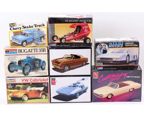 8 plastic car kits from various manufacturers, with specific examples including a Monogram 1/24th scale Bugatti 35B, an AMT 1