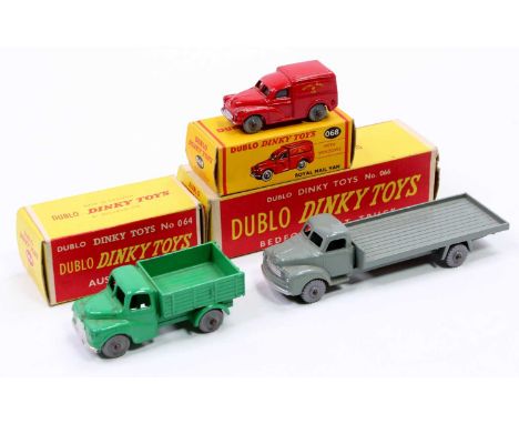 A collection of three various boxed Dublo Dinky Toy diecast vehicles to include No. 066 Bedford flat truck, No. 064 Austin lo