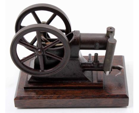 Circa 1900 early Paradox stationary gas engine, comprising of central single cylinder powering two 3.5" spoked fly wheels, fr