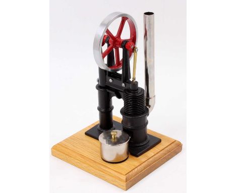 PM Research Inc, Solar-10 Vertical Hot Air Engine, comprising all metal and brass construction, hand painted in black, with r