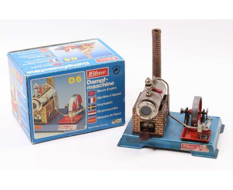 Wilesco D6 Stationary Steam Engine, of usual specification housed on tinplate base, with original box, height 22cm
